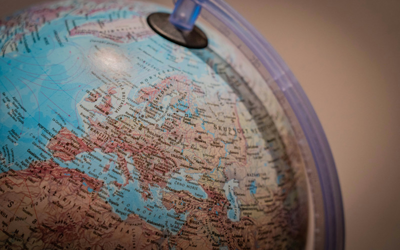 A desk globe turned to show the United Kingdom, Europe, North Africa and the Middle East